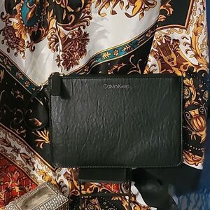 Calvin Klein Black wristlet 